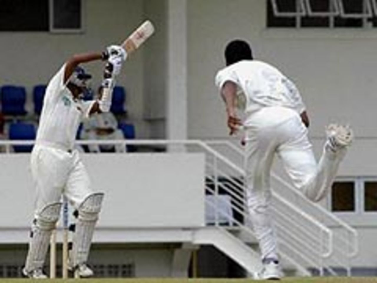 Thilan Samaraweera takes on Merv Dillon during the first Test at St Lucia