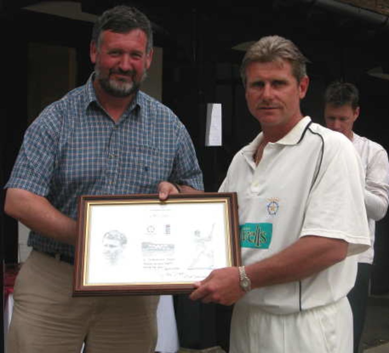Robin Smith presents Bob Noble Director of Sports and scorer at Charterhouse School