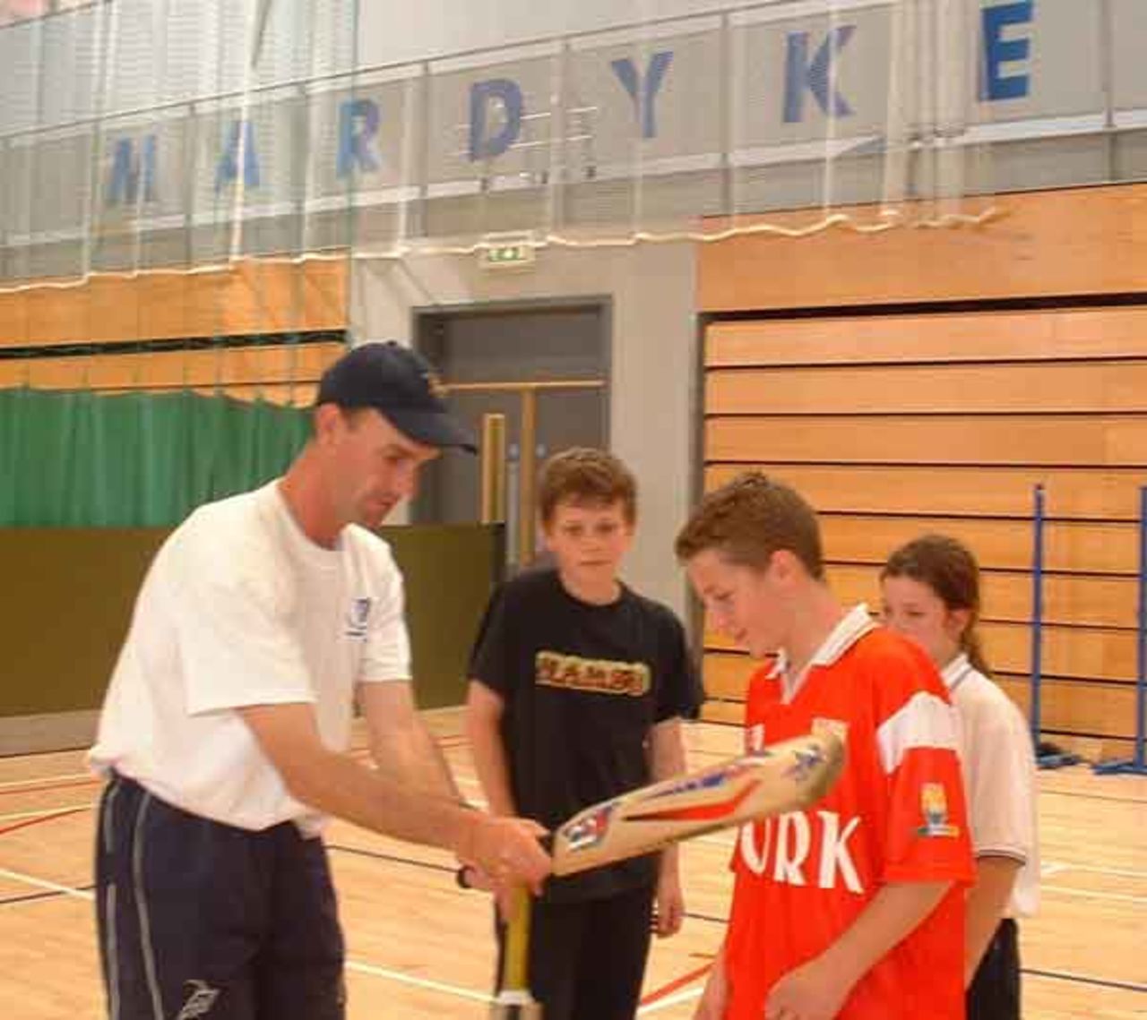 Brían O'Rourke offers advice to 12 year old Munster batsman Joe Sherlock