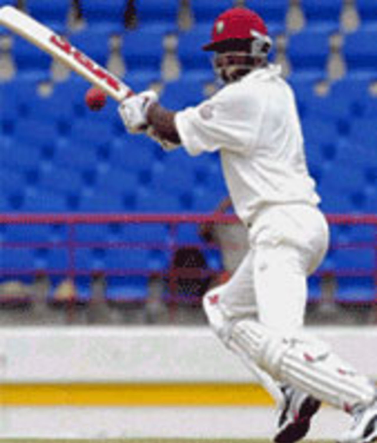 Brian Lara cuts Chaminda Vaas on the third day of the first Test at Beausejour Stadium, St Lucia