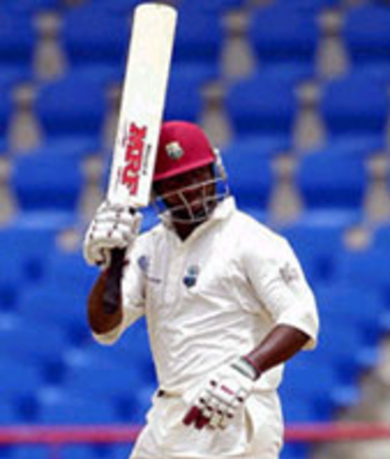 Brian Lara brings up his double hundred in his innings of 209 on the fifth day of the first Test match against Sri Lanka at Beausejour Stadium, St. Lucia