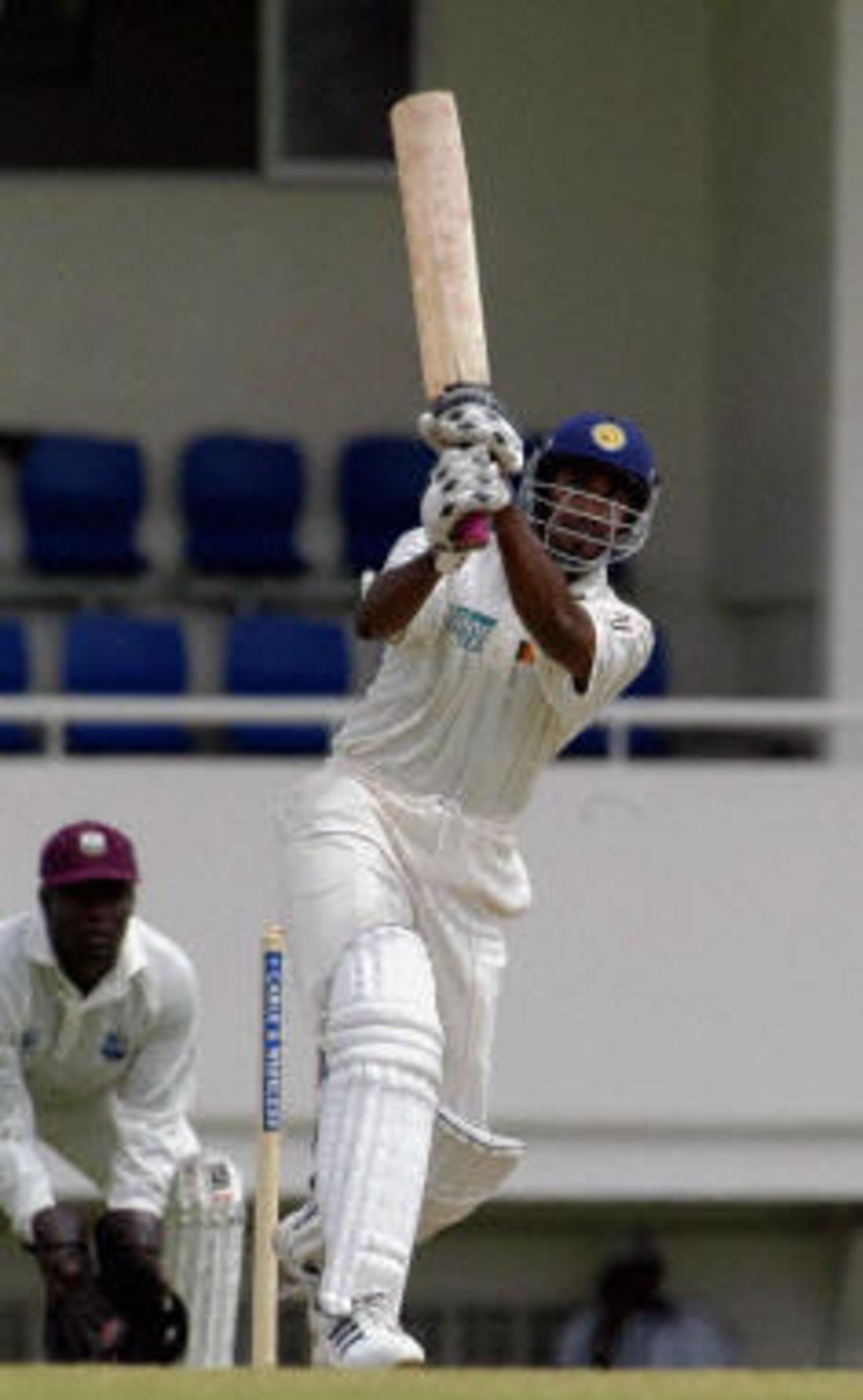 Chaminda Vaas lifts West Indies bowler Wavell Hinds for 4 during his innings of 38 on the second day of their first test match at St Lucia.
