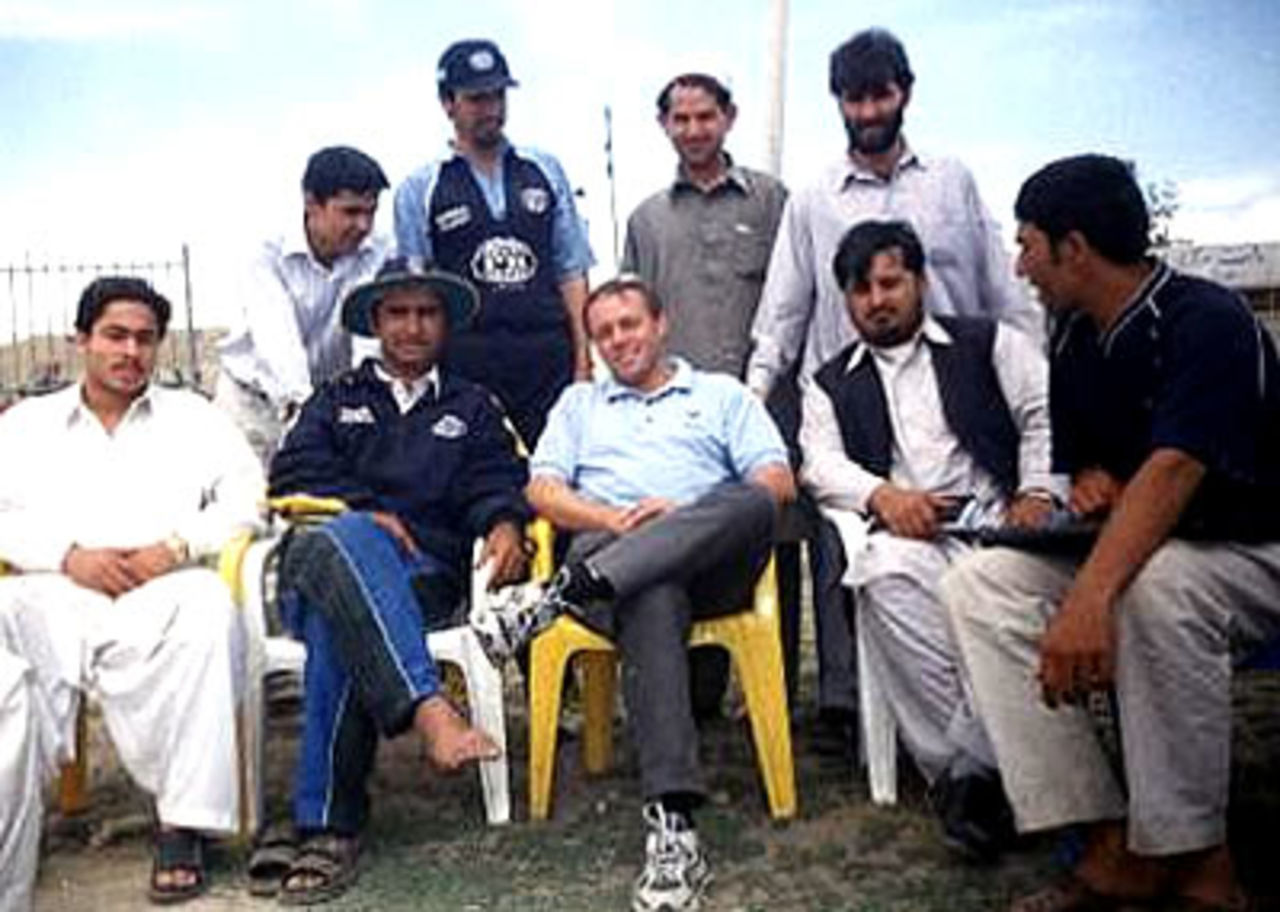 Steve Brooking (centre) and to his right, Taj Malik Afghan National Coach watching the final. The first Olympia Lube Oil Tournament was held in Kabul, 5 - 20 May 2003. Khost team won the final defeating Pir Baba Cricket Academy (PBCA) team by 25 runs. Scores: Khost 185-9 and PBCA 160. MoM: Nowroz Khan (75no, 4w).