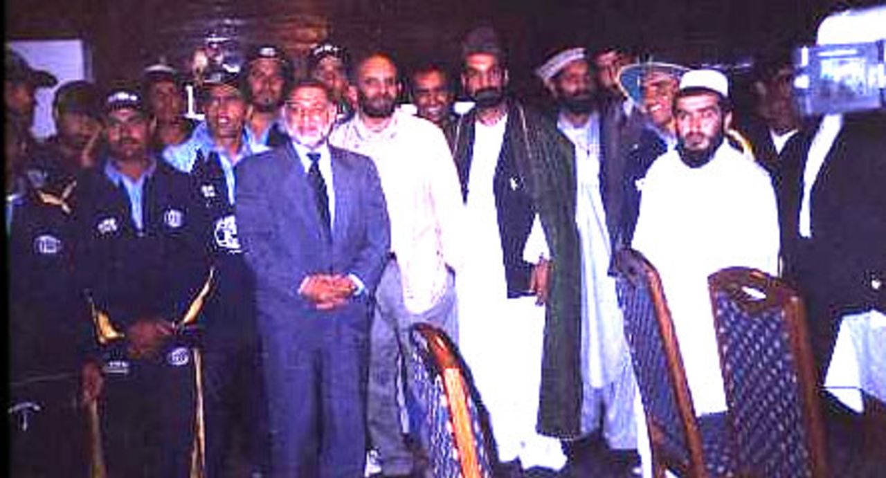 Planning Minister Ahmad Yousaf Nooristani (suit), to his left President of National Sports Committee (NSC) Mohammad Anwer Jigdalak, to his left is Ministerial Advisor Shahzada Masood and others during the ACF Annual General Meeting held in Kabul, 25 July 2003.