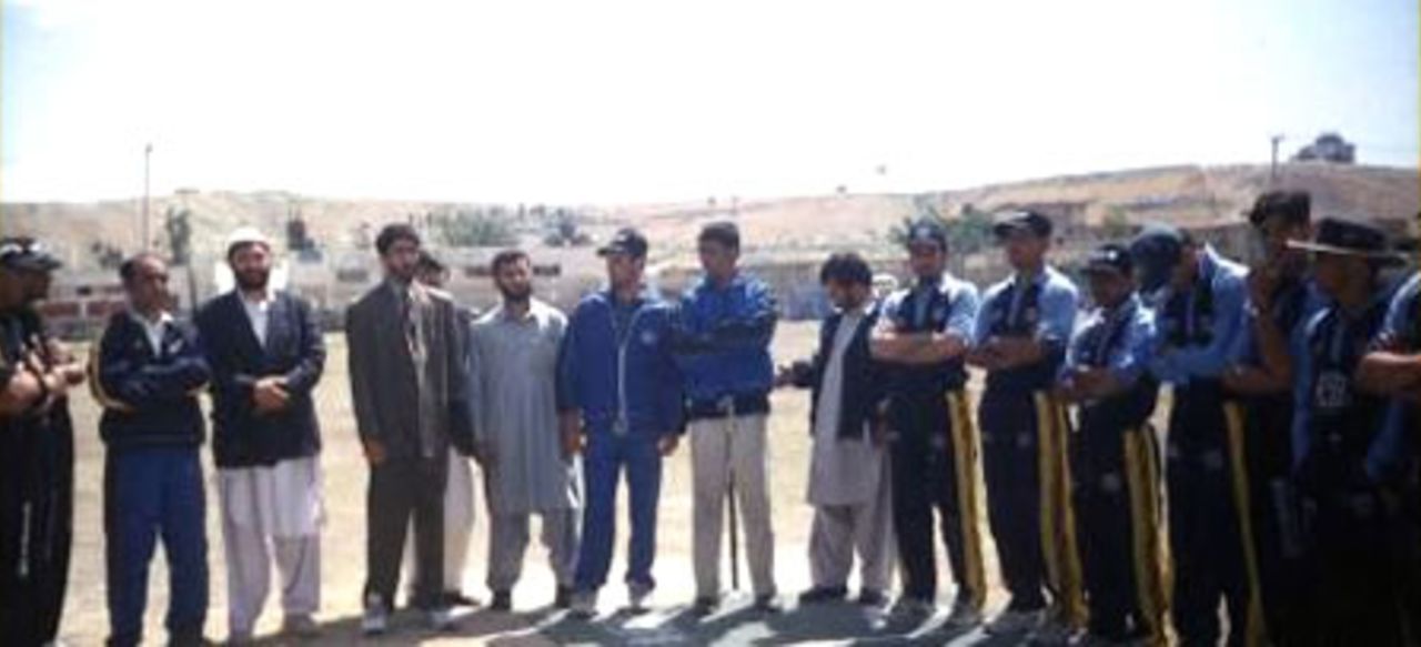 Allah Dad Noori (suit) addressing players before the final of the first Olympia Lube Oil Cricket Tournament held in Kabul, 5 - 20 May 2003. Khost team won the final defeating Pir Baba Cricket Academy (PBCA) team by 25 runs. Scores: Khost 185-9 and PBCA 160. MoM: Nowroz Khan (75no, 4w).