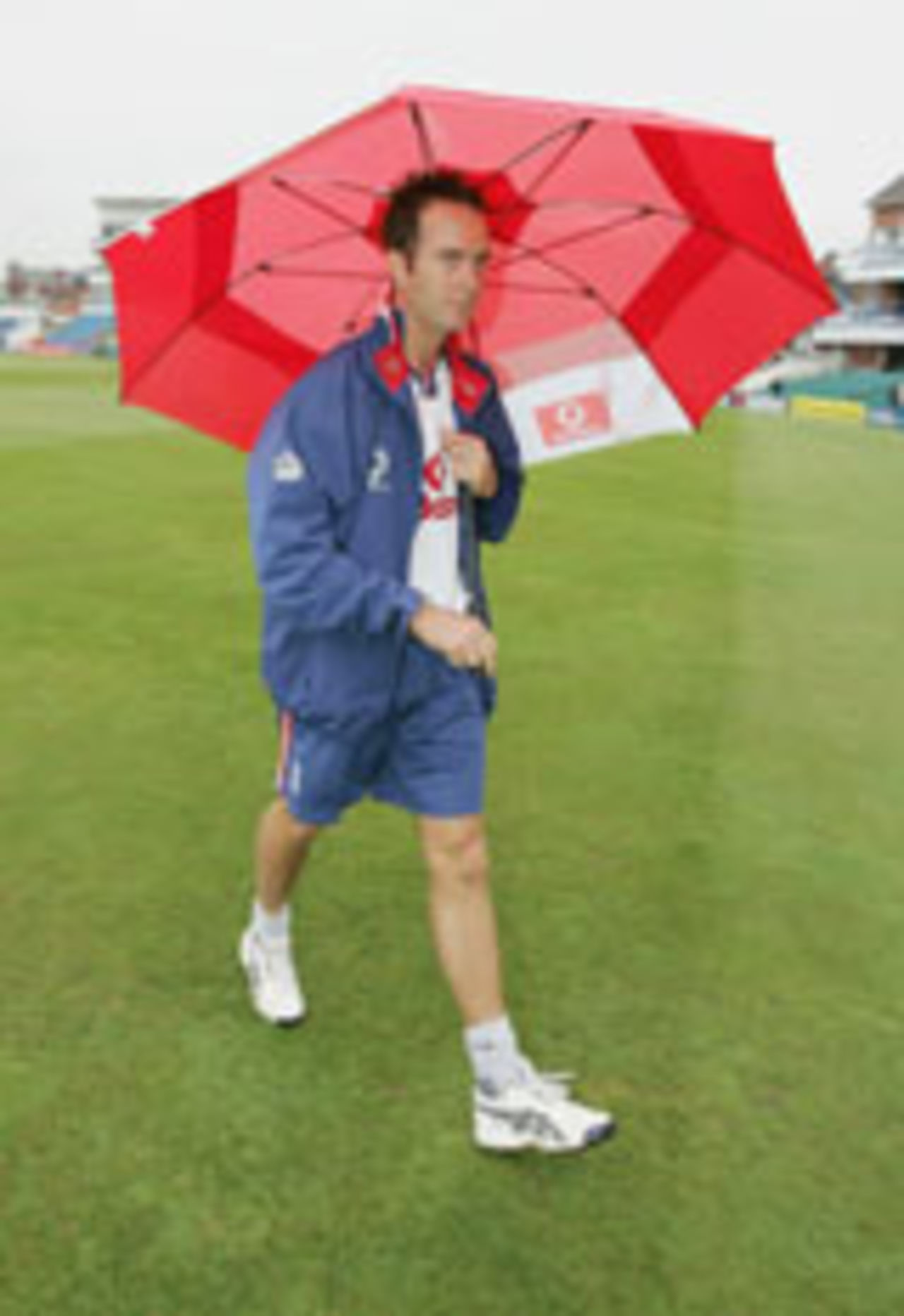 Michael Vaughan with an umbrella at Headingley, England v  New Zealand, 2nd Test, June 3, 2004