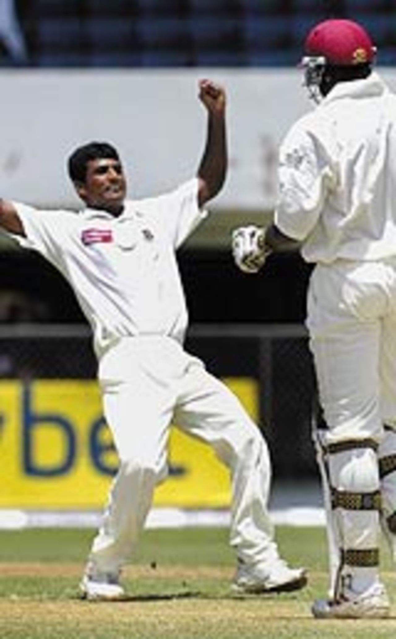 Tareq Aziz Khan celebrates the dismissal of Chris Gayle, West Indies v Bangladesh, 2nd day, 2nd Test, Jamaica, June 5, 2004