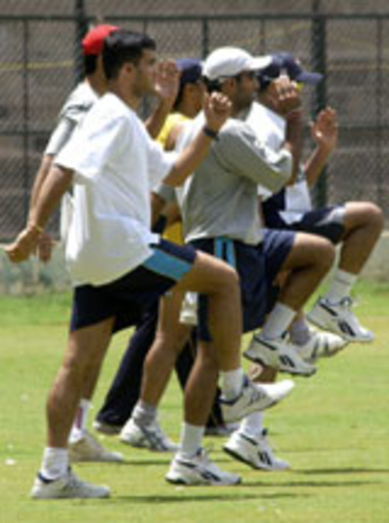 Sourav Ganguly leads his players in training, Bangalore, June 17, 2004