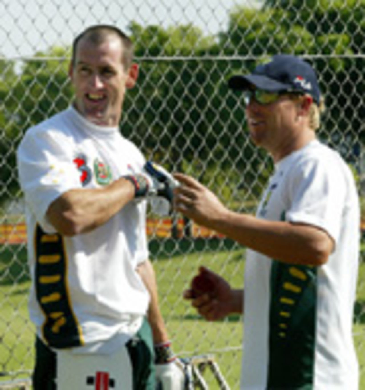 Shane Warne and Matt Elliott in the nets, Darwin, June 30, 2004