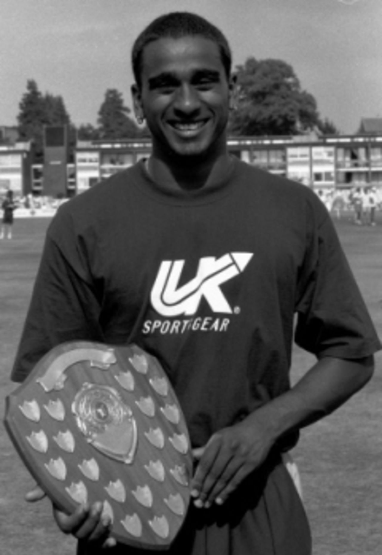 Dimitri Mascarenhas hold the Hampshire Exiles Young Player of the Season shield, won for his performances in 1998.