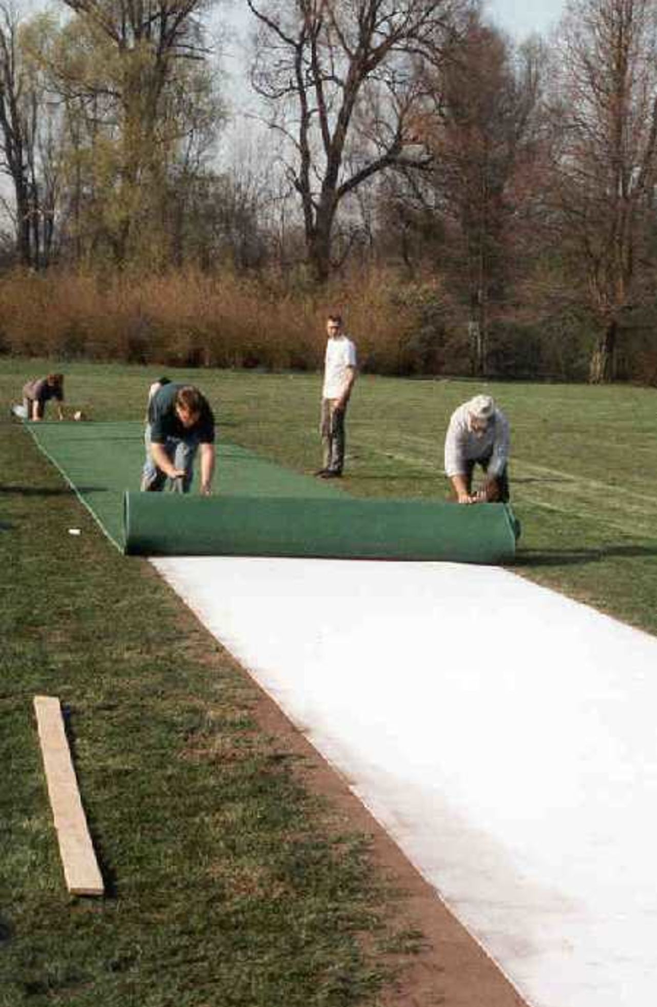 The Belgium Cricket Federation staff lay an artificial pitch at Mechelen - Stage 3