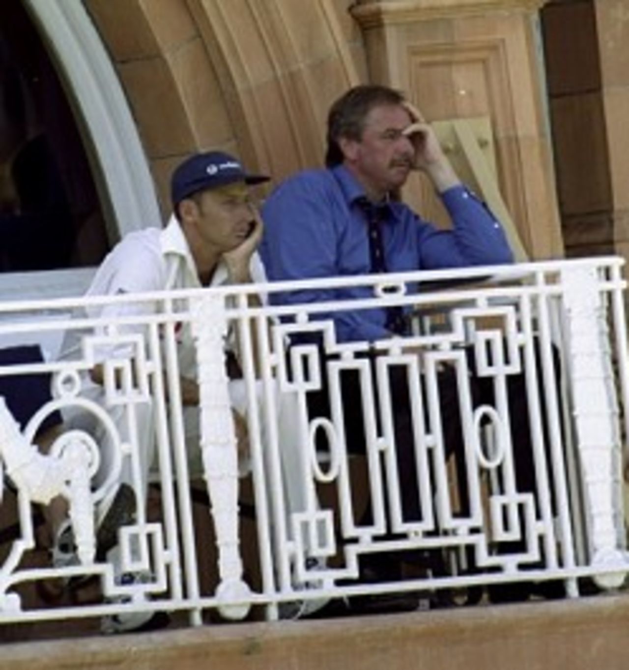 Nasser Hussain of England and David Graveney feel the presure as they watch the game from the players balcony during the second test against New Zealand played at Lords in London. 22 July 1999.