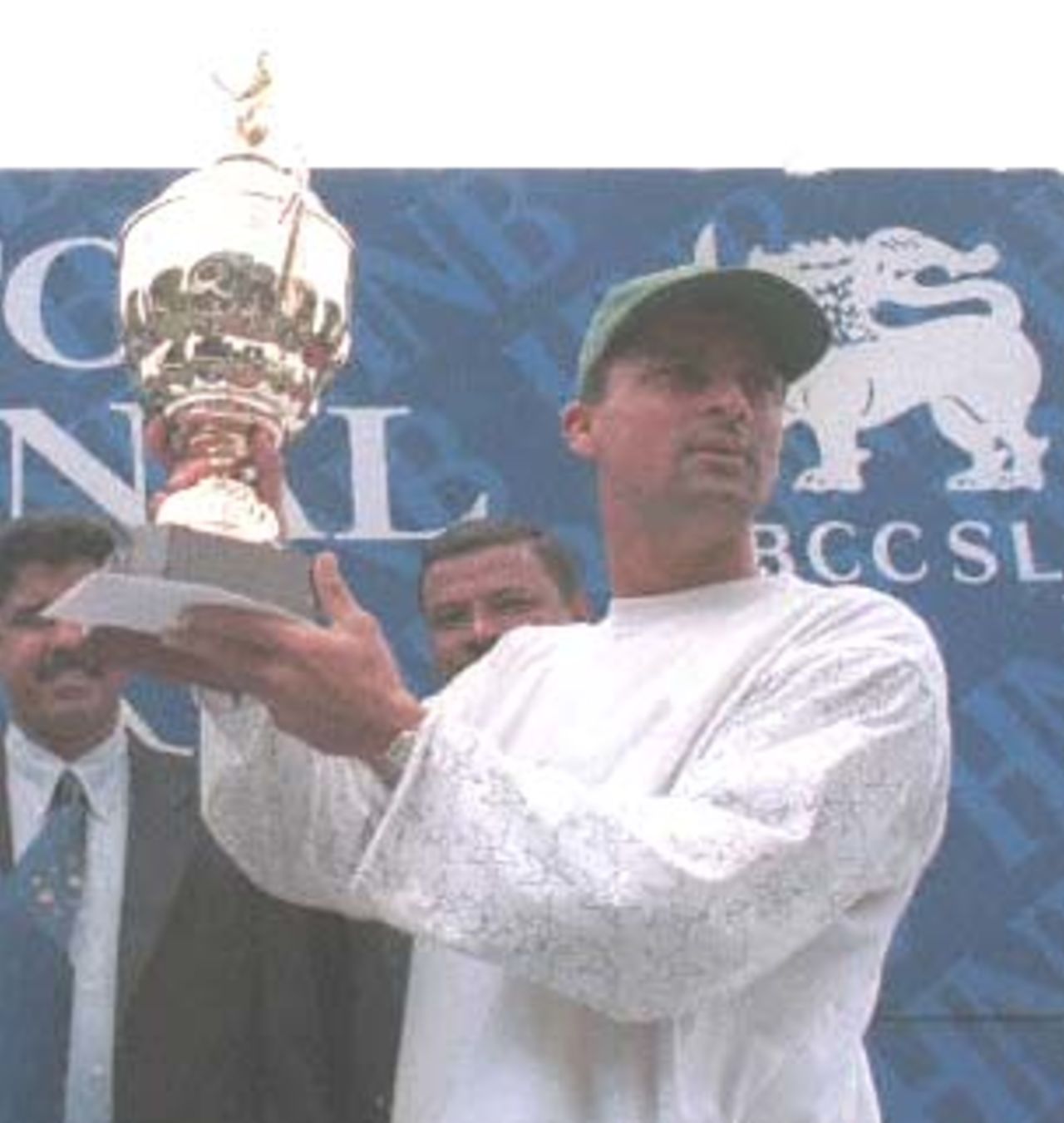 Pakistan skipper Moin Khan raises the trophy after the third and final Test against Sri Lanka was abandoned due to rain. Pakistan won the three test series 2-0. Pakistan in Sri Lanka 1999/00, 3rd Test, Sri Lanka v Pakistan Asgiriya Stadium, Kandy, 28 June - 02 July 2000 (Day  5)