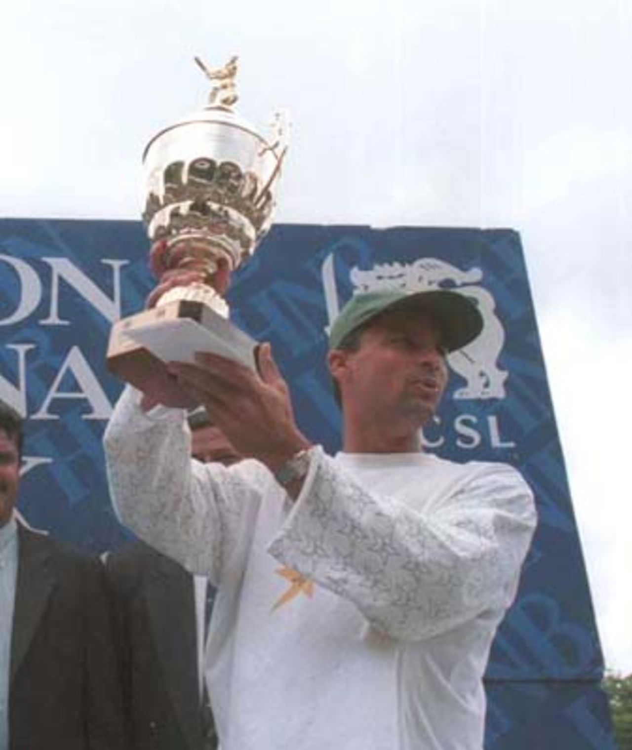 Moin Khan with HNB trophy during the fifth day of the third and final cricket Test between Sri Lanka and Pakistan in Asgiriya International cricket stadium in Kandy, Sri Lanka on Saturday, July.1, 2000