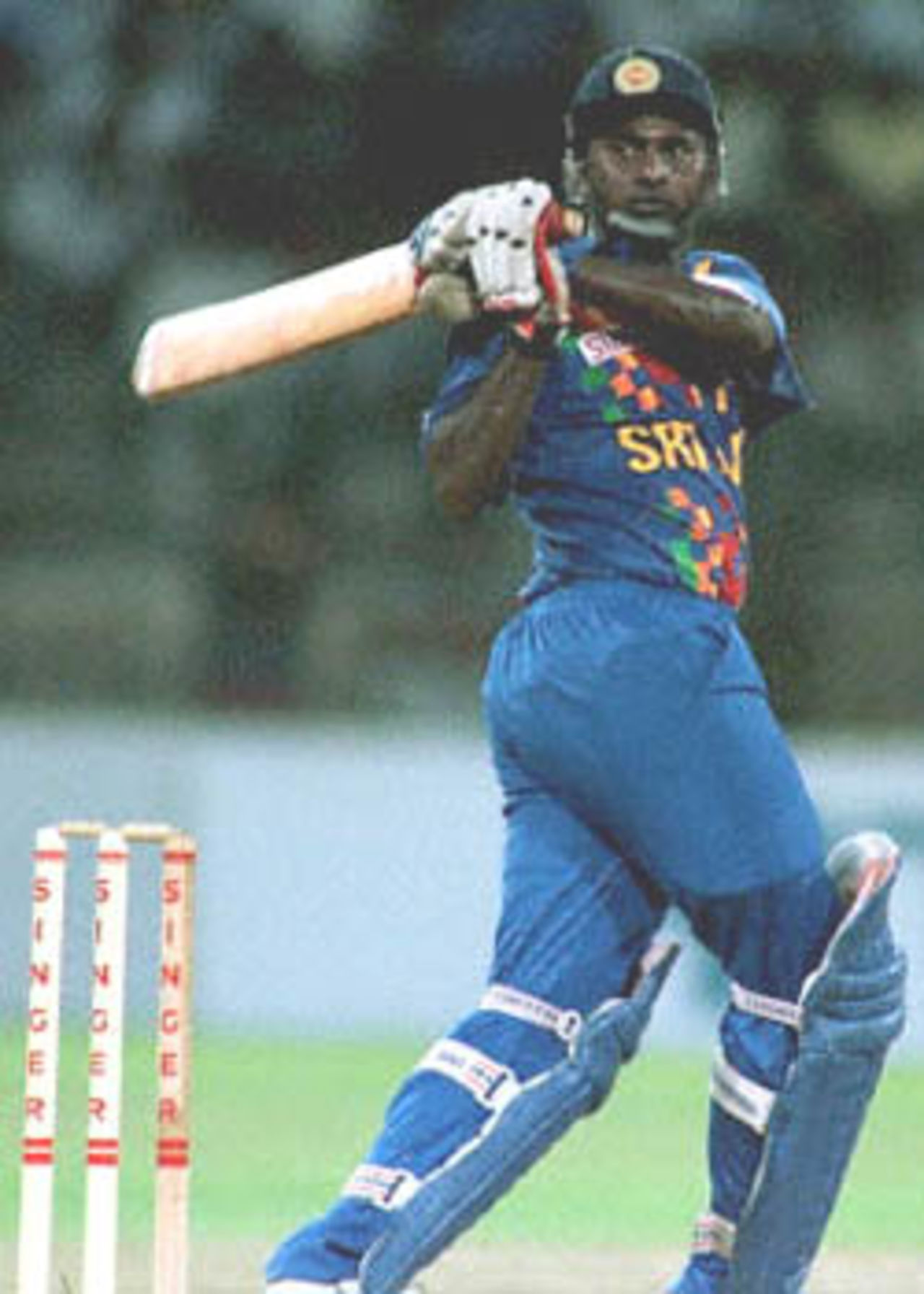 Sri Lankan opening batsman Avishka Gunawardene slams the ball while scoring 47 against Pakistan in their one-day international 09 July 2000. Singer Triangular Series, 2000, 4th Match, Sri Lanka v Pakistan, R.Premadasa Stadium, Khettarama, Colombo,