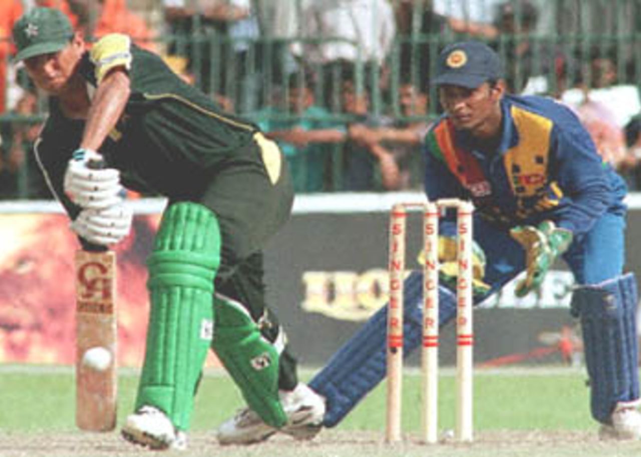 Pakistan batsman Younis Khan defends his wicket on his way to becoming the top scorer for his side with 59 in the one-day international against Sri Lanka 09 July 2000 in the Singer Triangular tournament. 4th Match, Sri Lanka v Pakistan, R.Premadasa Stadium, Khettarama Colombo.