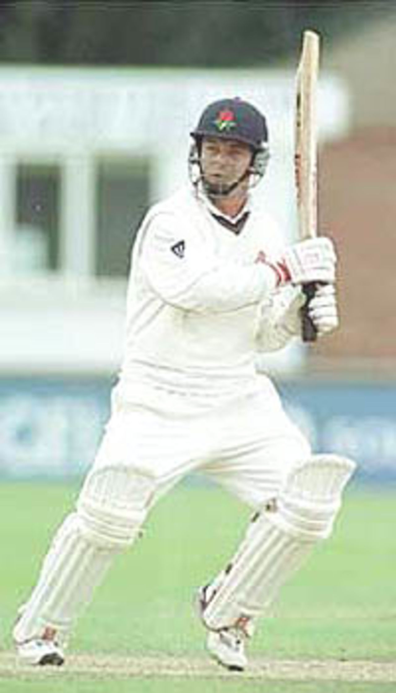 Graham Lloyd watches the course of the ball after playing the cut, PPP healthcare County Championship Division One, 2000, Derbyshire v Lancashire, County Ground, Derby, 07-10 July 2000 (Day 2).