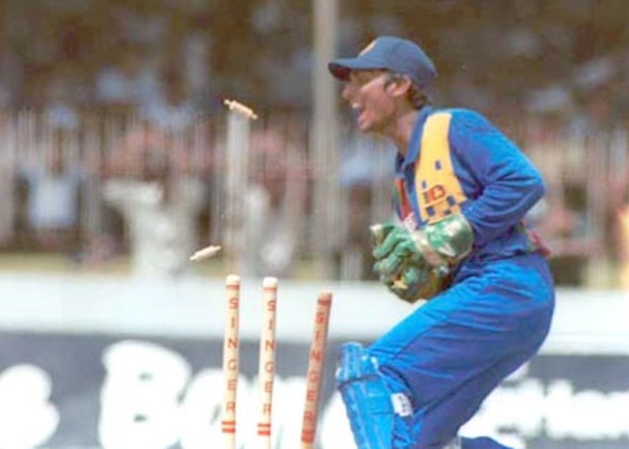 Sangakkara appeals for a run out after breaking the stumps. Singer Triangular Series 2000/01, Sri Lanka v South Africa, Sinhalese Sports Club Ground, Colombo 11 July 2000