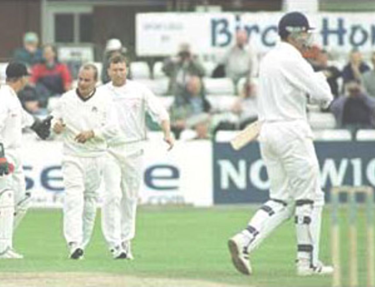 Graham Lloyd congratulated by teammates after catching Stubbings, PPP healthcare County Championship Division One, 2000, Derbyshire v Lancashire, County Ground, Derby, 07-10 July 2000 (Day 3).