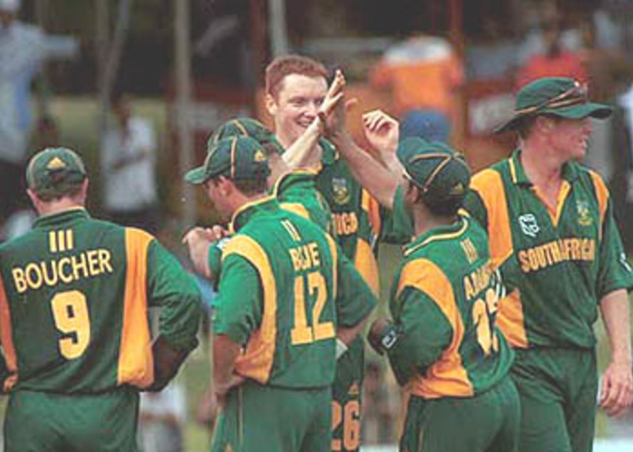 David Terbrugge shares his joy with his teammates. Singer Triangular Series 2000/01, (6th Match) Pakistan v South Africa, Sinhalese Sports Club Ground Colombo, 12 July 2000.