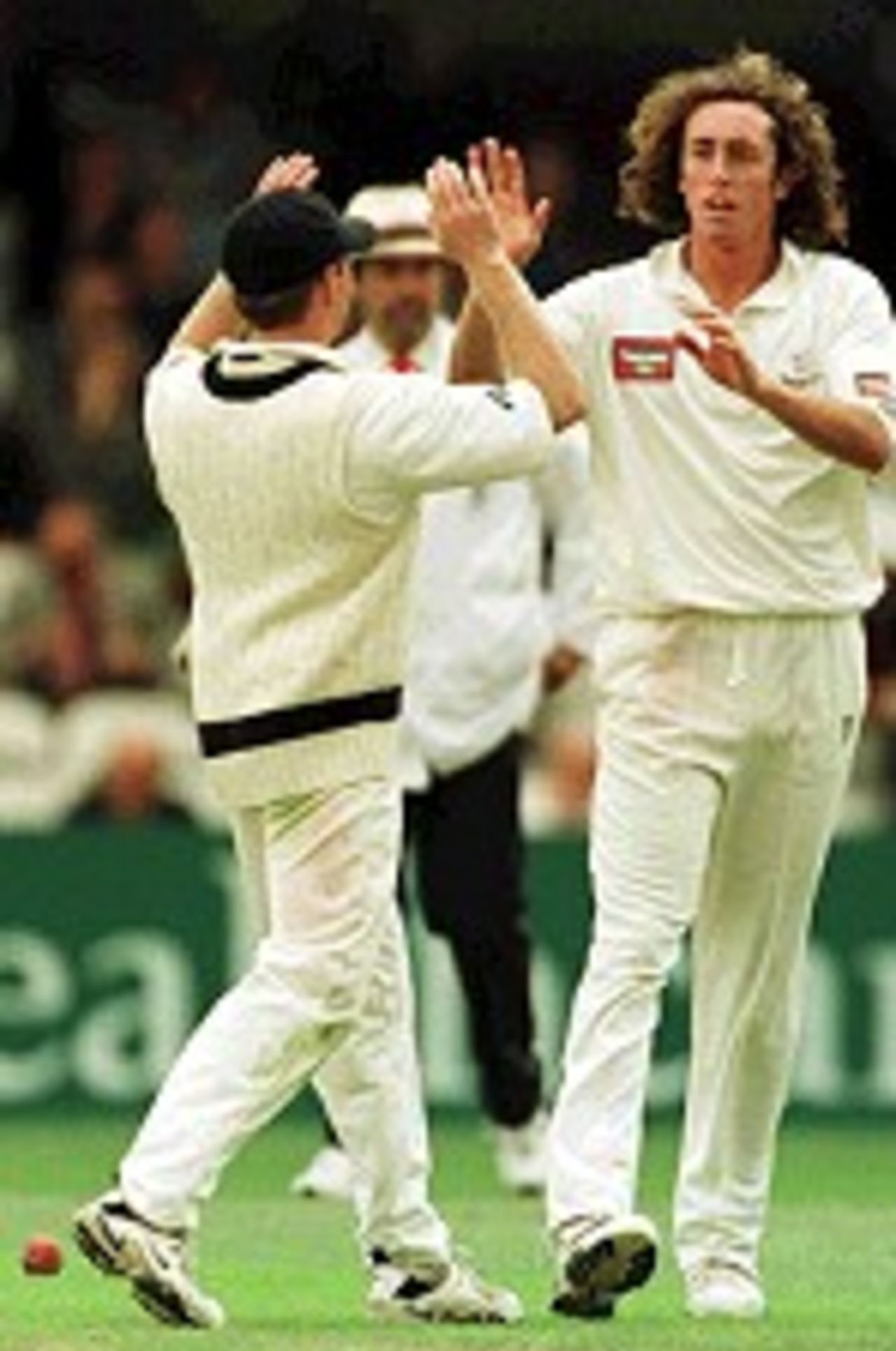 12 July 2000. Ryan Sidebottom of Yorkshire celebrates taking the wicket of Ben Hollioake of Surrey, caught by Gary Fellows on the first day of the PPP Healthcare Division One County Championship match at the Oval in London.
