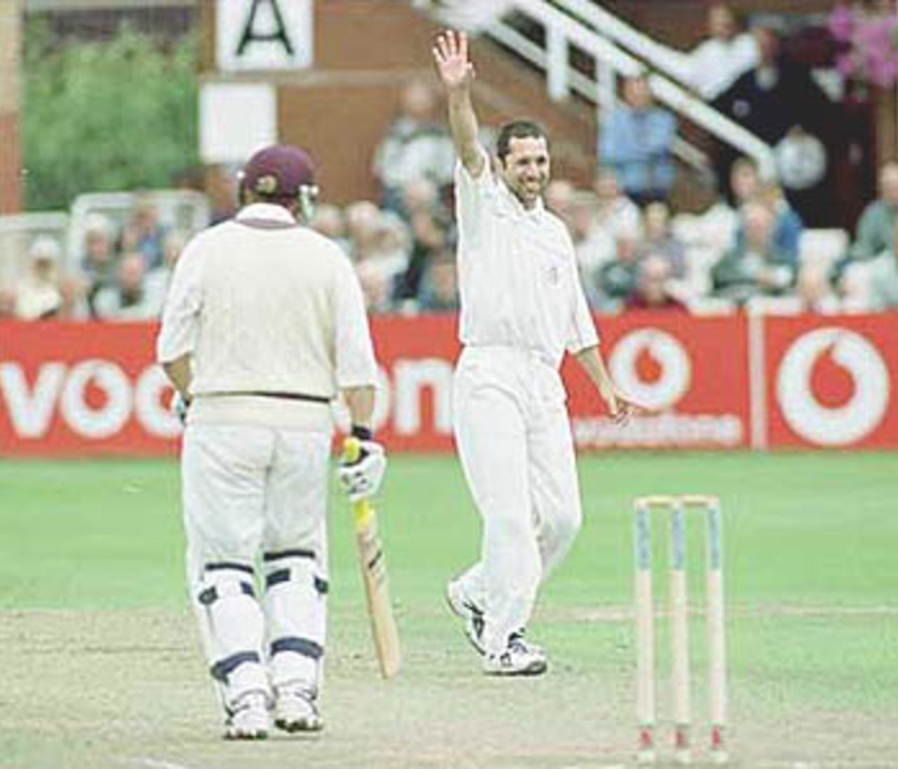 Scuderi watches in delight as Lathwell walks back to the pavilion after being trapped LBW, PPP healthcare County Championship Division One, 2000, Somerset v Lancashire, County Ground, Taunton, 12-15 July 2000(Day 2).