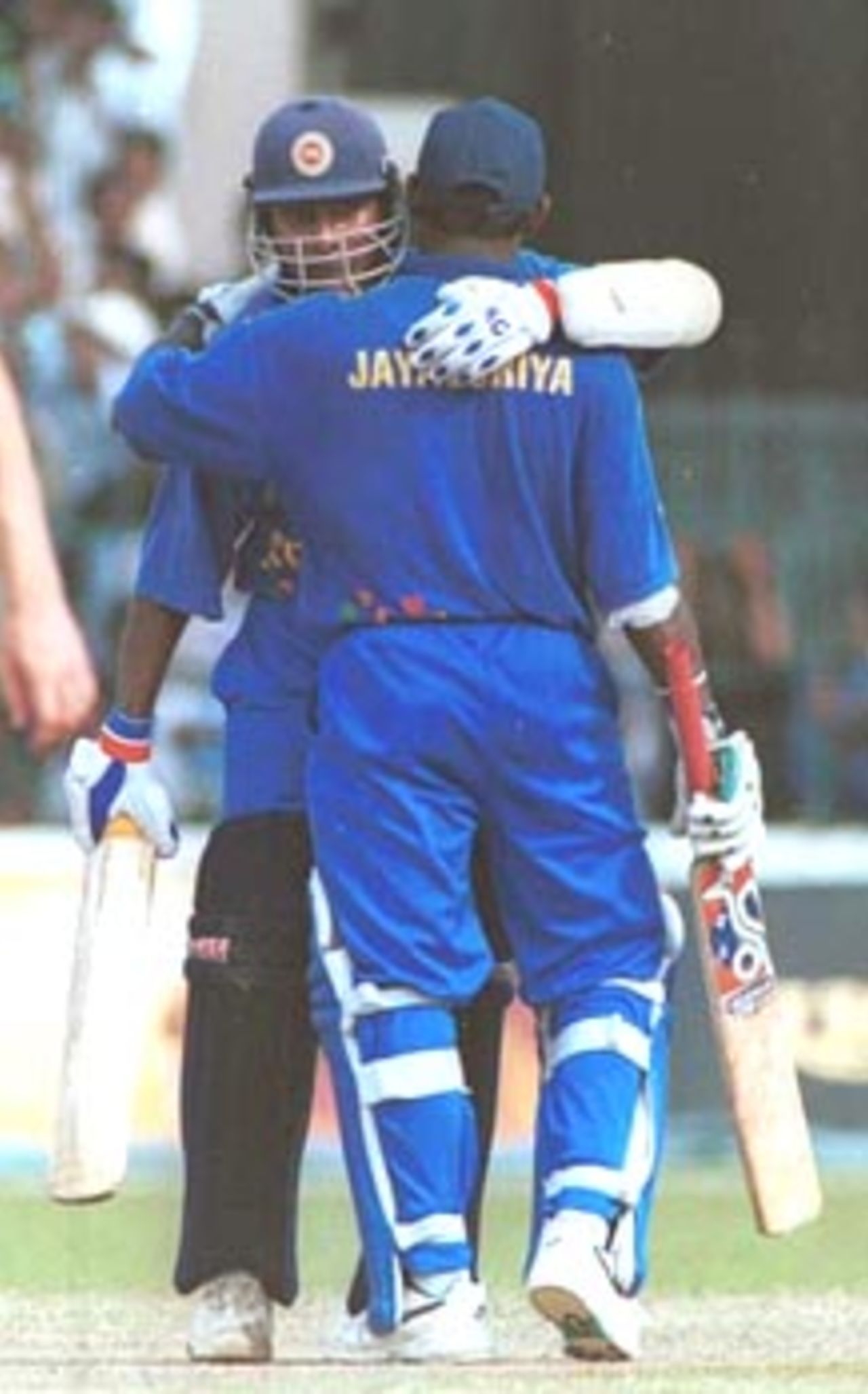 Jayasuriya gets a well deserved hug from Jayawardene. Singer Triangular Series 2000/01, Final, Sri Lanka v South Africa, R.Premadasa Stadium, Khettarama, Colombo 14 July 2000