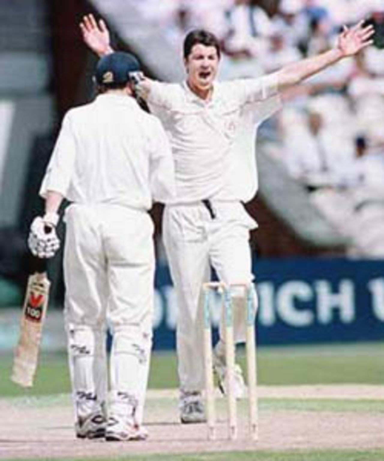 Smethurst throws his arms up in celebration of trapping Collingwood leg before, PPP healthcare County Championship Division One, 2000, Lancashire v Durham, Old Trafford, Manchester 19-22 July 2000 (Day 1).