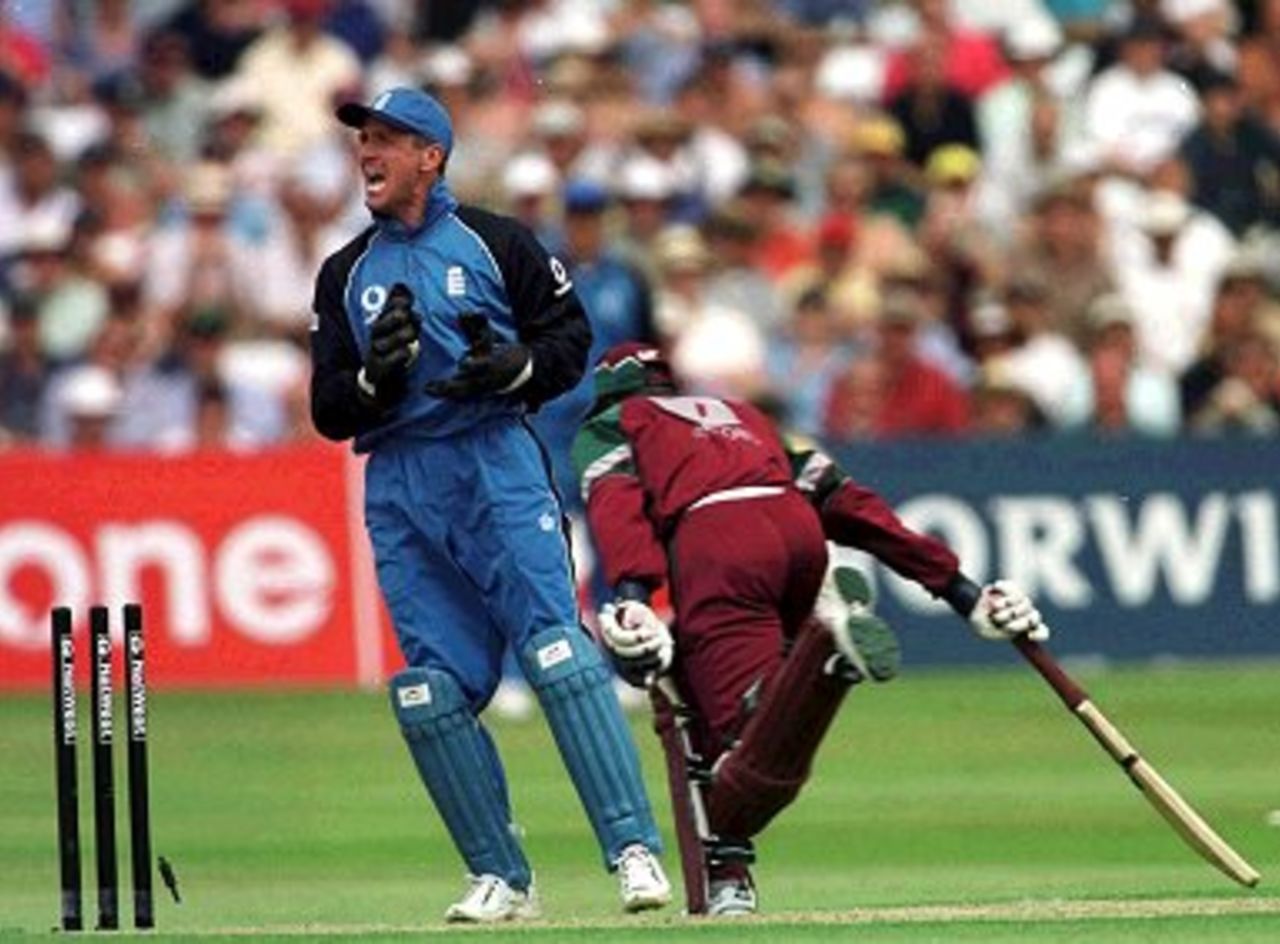 20 Jul 2000: Alec Stewart of England runs out Ridley Jacobs during the NatWest Series One Day International between England and West Indies at Trent Bridge, Nottingham.
