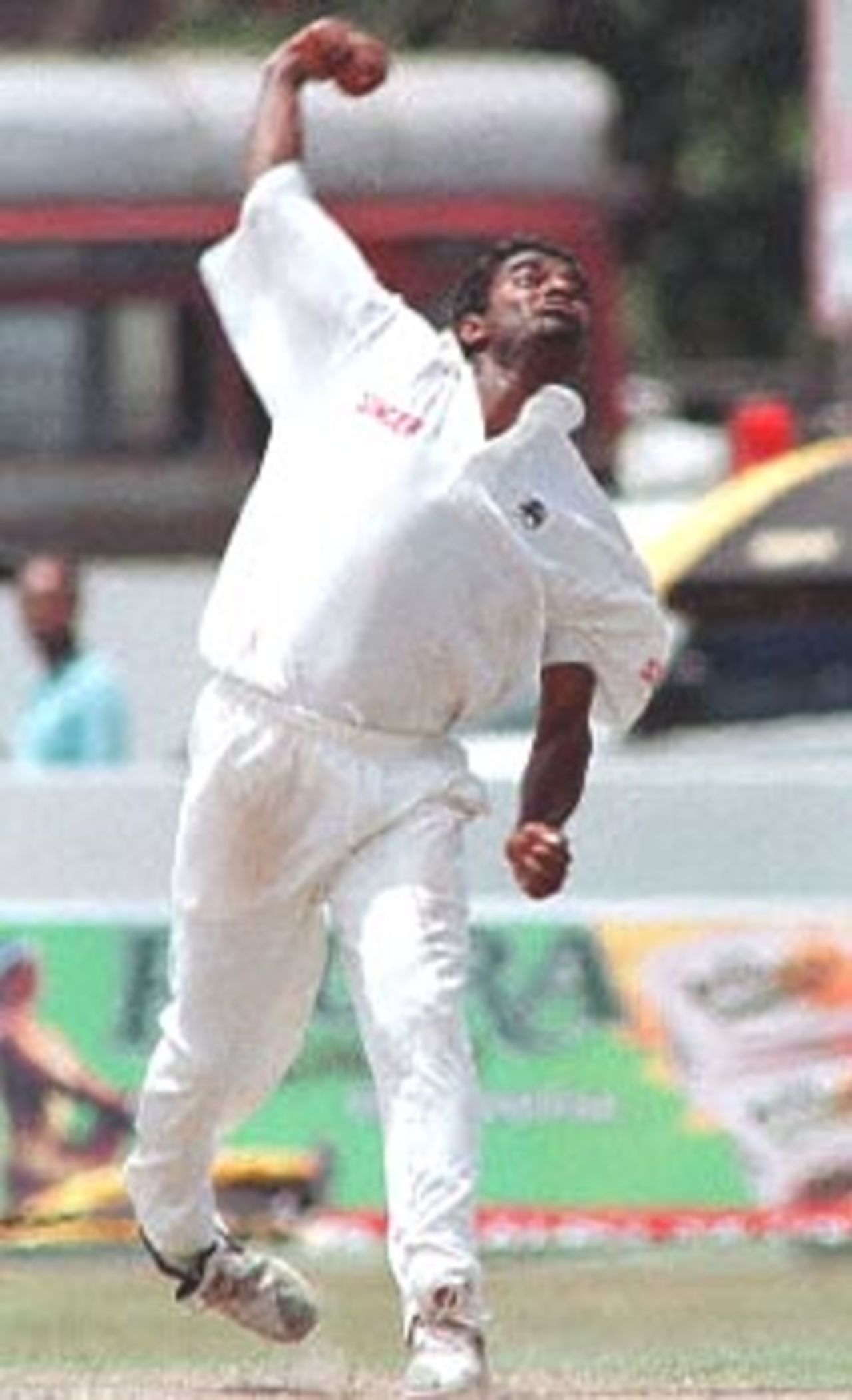 Muralitharan in action against South Africa. Sri Lankan bowler Muttiah Muralitharan bowls during the  first cricket Test against South Africa. South Africa in Sri Lanka 2000/01, 1st Test, Sri Lanka v South Africa Galle International Stadium, 20-24 July 2000. (Day 3)
