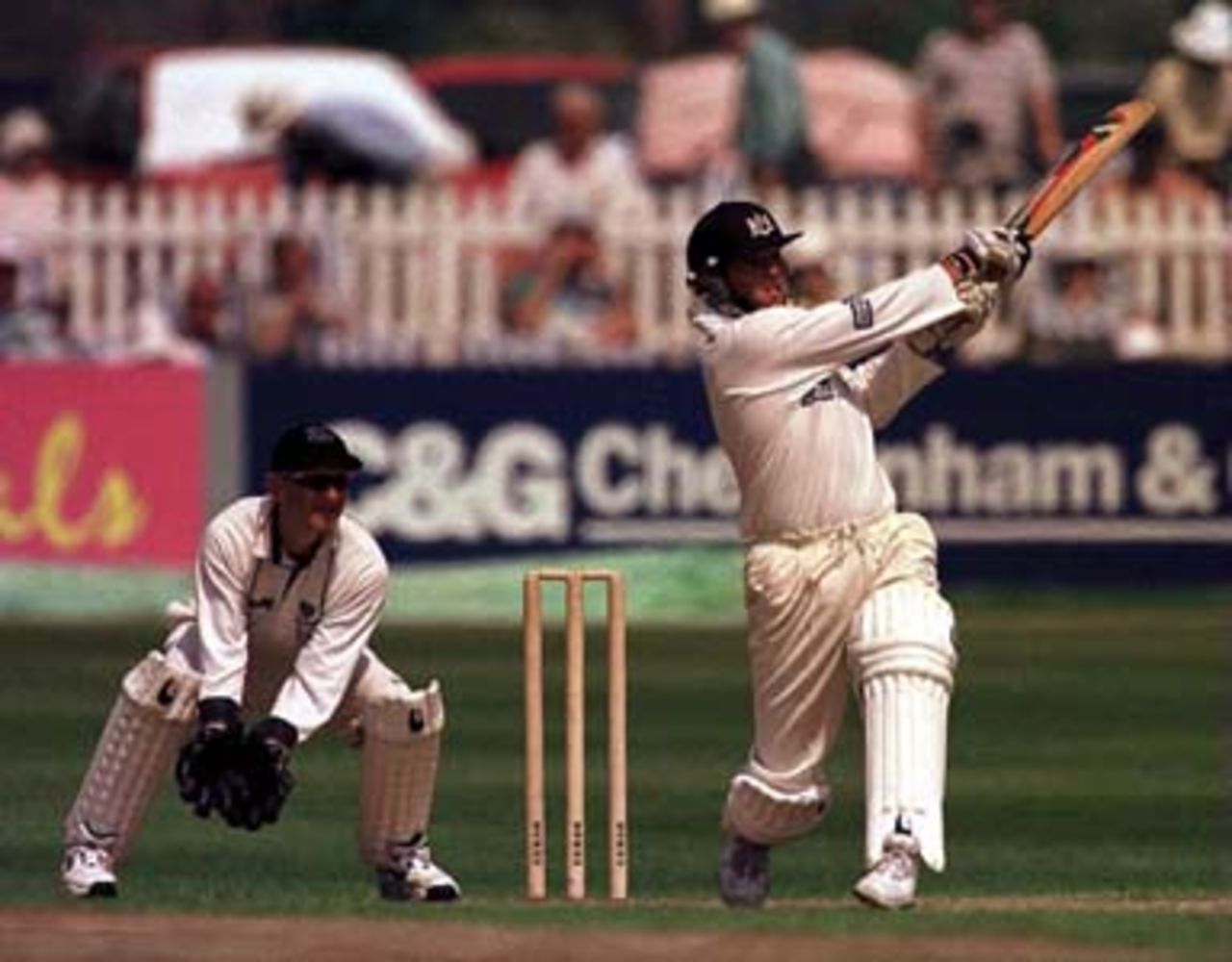 9 May 2000. Ian Harvey of Gloucestershire strikes another boundary, with Shaun Humphries of Sussex behind the stumps during the Benson & Hedges Quarter Final match at the County Ground at Hove in Sussex.