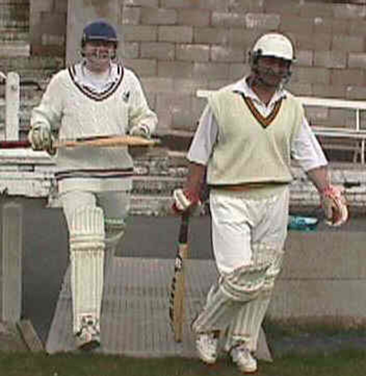 Accrington openers Steve Birtwistle and Mushtaq Ahmed step out to face the Colne bowlers at Thorneyholme Road.