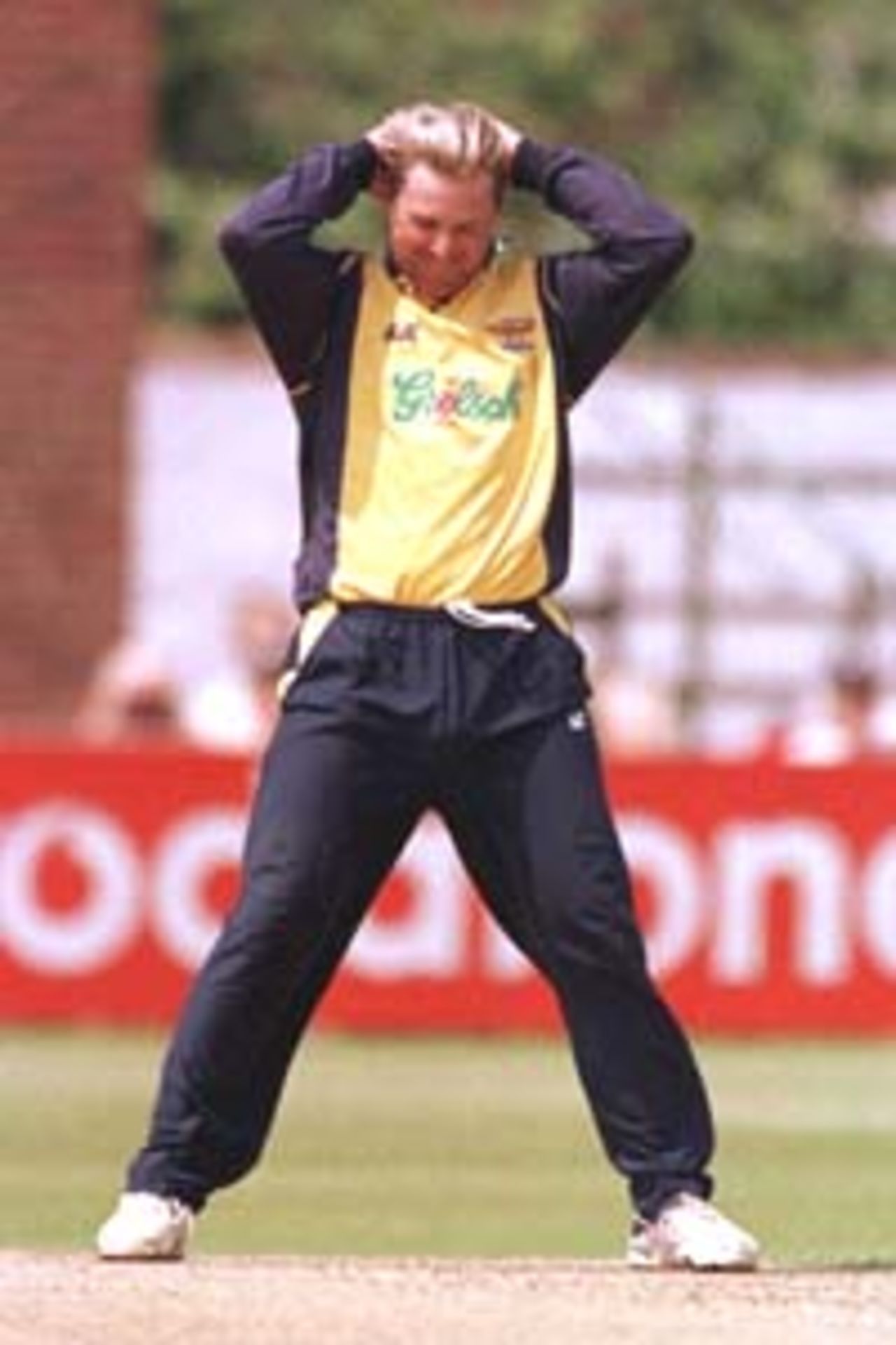 27 June 2000. Shane Warne of Hampshire in despair against Surrey during the NCL Division Two match at the County Ground in Southampton
