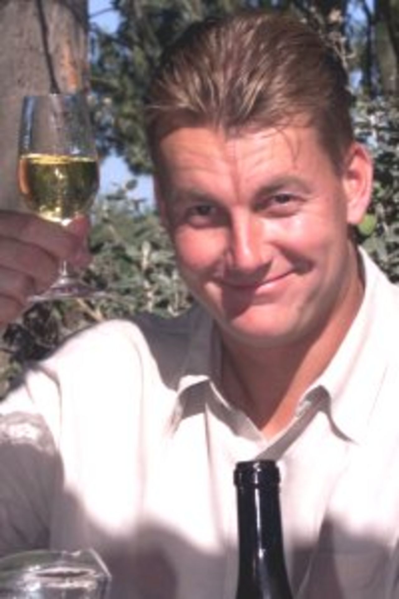 24 Feb 2000: Shane Lee of Australia enjoys a glass of white wine, during a visit to Giesen Wine Estate Canterbury, Christchurch, New Zealand.