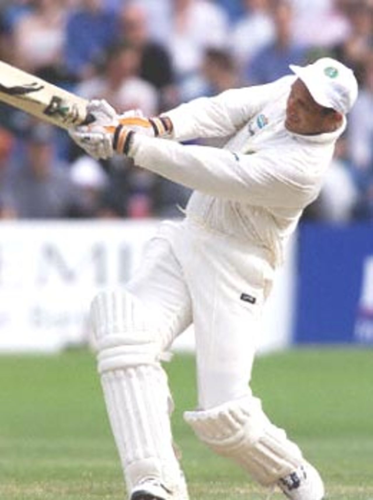 Mark Butcher, England's opening batsmen, cracks a four in the Malcolm Marshall memorial match at the Honourable Artillery Company cricket ground in London 27 July 2000. The match was played in honour of Malcolm Marshall, the West Indies fast bowler who died of cancer last year at 41, to raise money for his widow and 7-year old son, Mali.