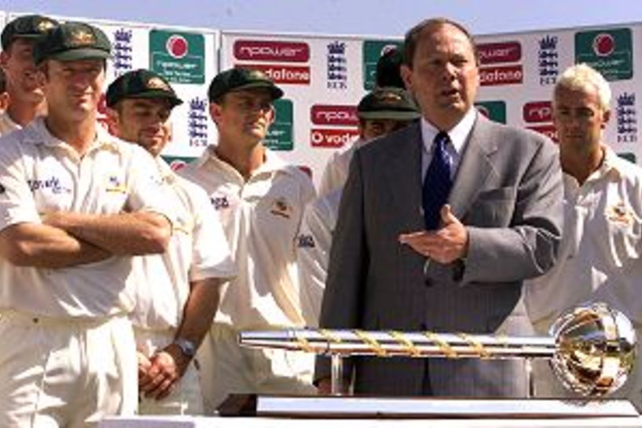 David Richards of the ICC presents Steve Waugh and the Australian team with the trophy as World Champions of Test Match Cricket, at Edgbaston, Birmingham, England.