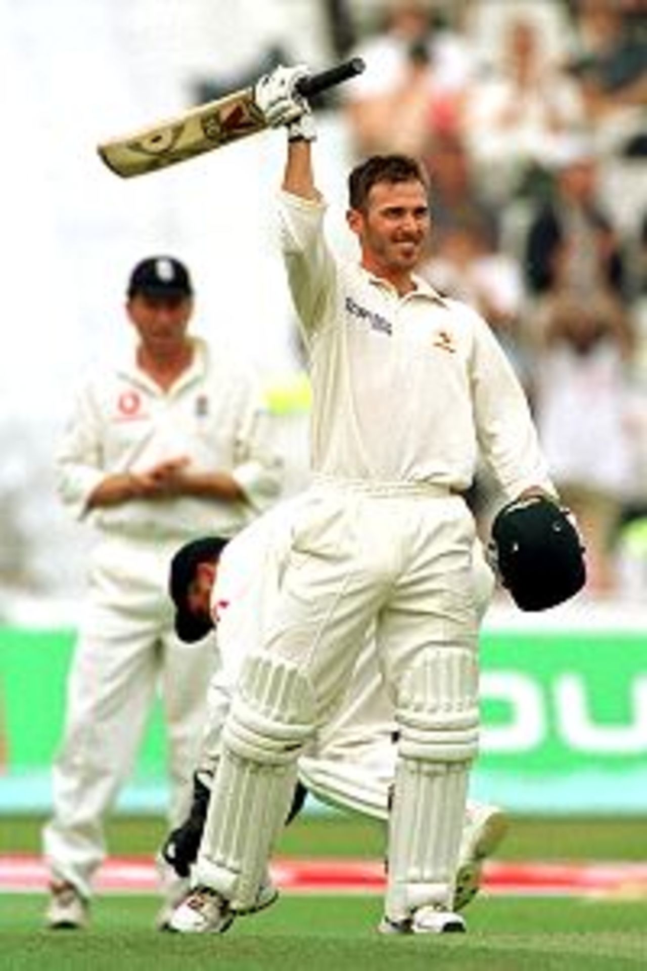 Damien Martyn of Australia salutes his 100 runs not out during the third day of the England v Australia first test match at Edgbaston, Birmingham.
