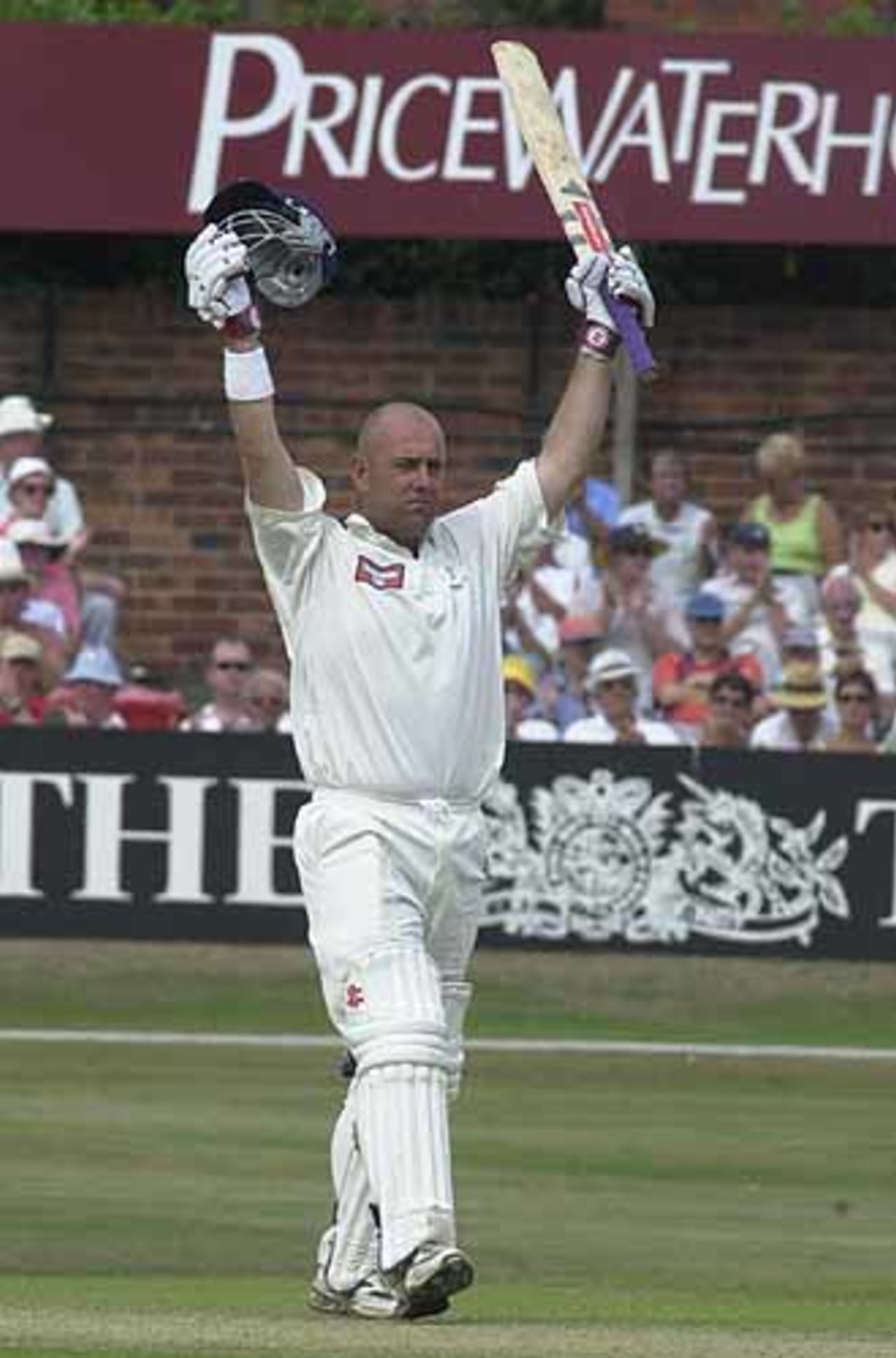 Lehmann raises his arms in delight to the warm applause from the Leeds faithful as he gets his ton, CricInfo Championship, 2nd Day, 29 July 2001