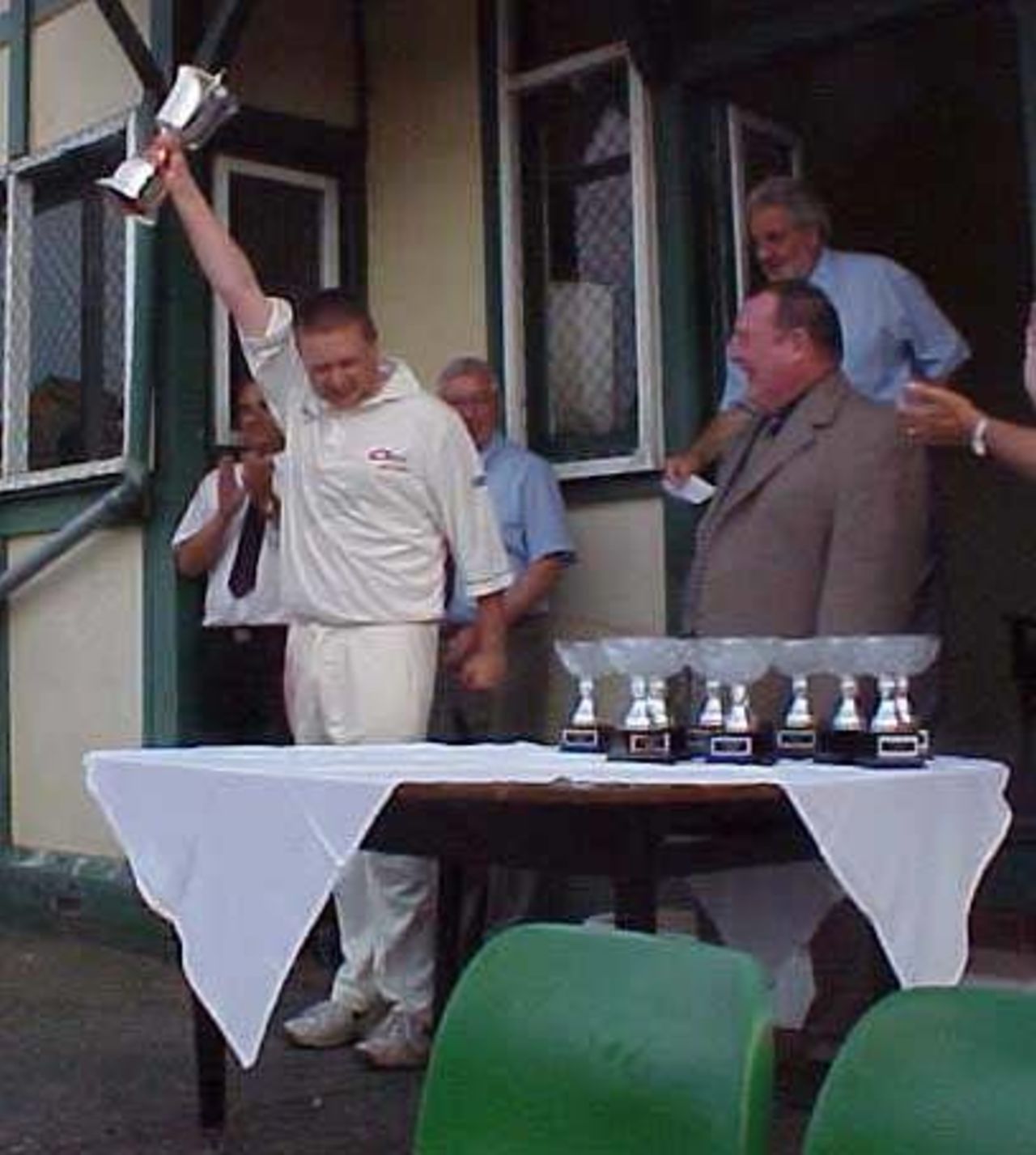 Barden holds the trophy aloft