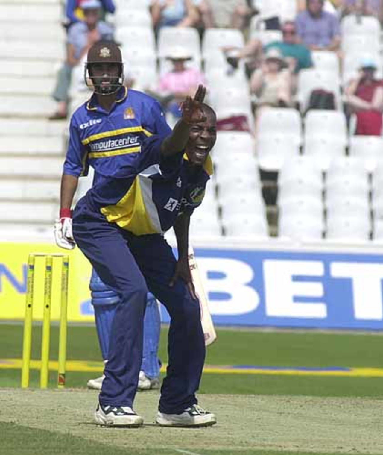 Vasbert Drakes appeals successfully for the wicket of Shahid for 4, Norwich Union League , 29th July 2001, Birmingham