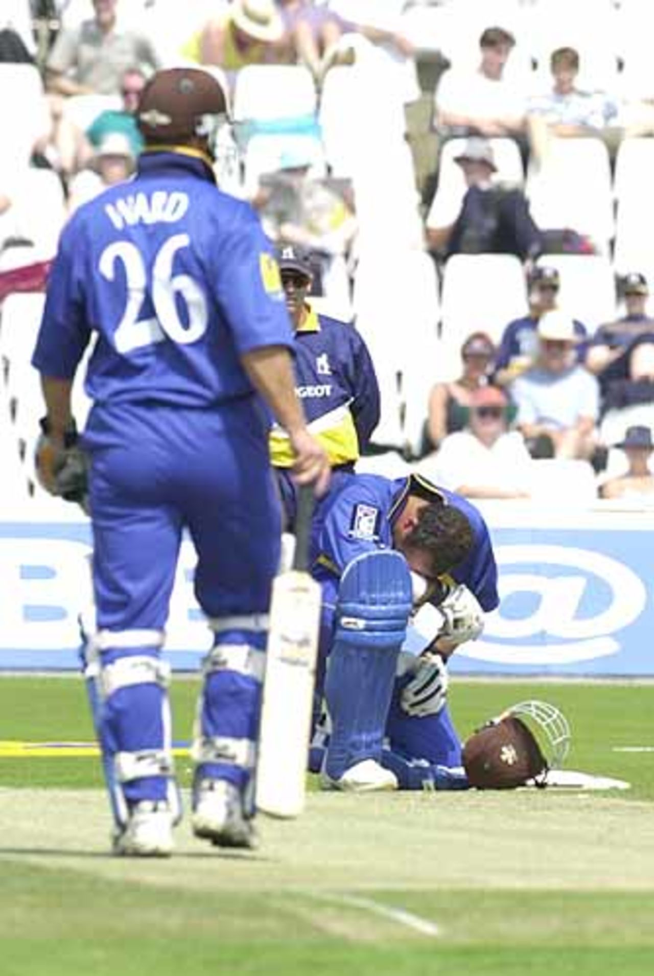 Mark Butcher is felled by a ball from Carter, Norwich Union League , 29th July 2001, Birmingham