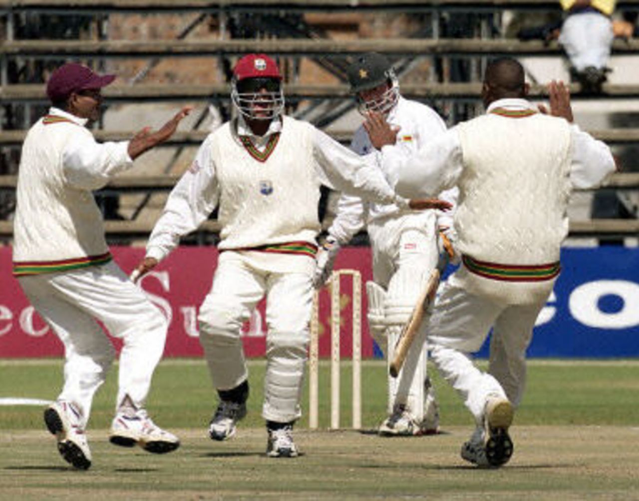 Shivnarine Chanderpaul (L) and Darren Ganga celebrate the LBW of Craig Wishart, West Indies v Zimbabwe 2nd Test at Harare, 27-31 July 2001.