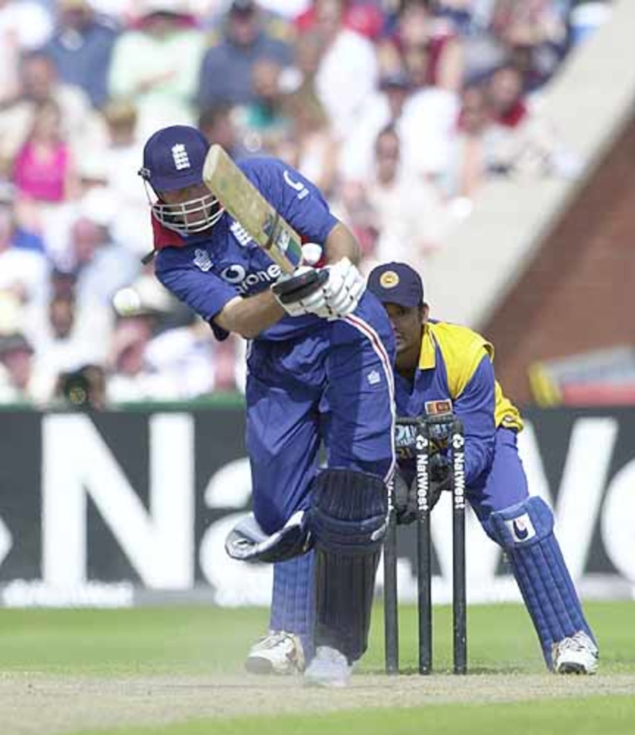 Vaughan mis-times this Chandana delivery back in to the hands of the bowler, England v Sri Lanka at Manchester, July 2002