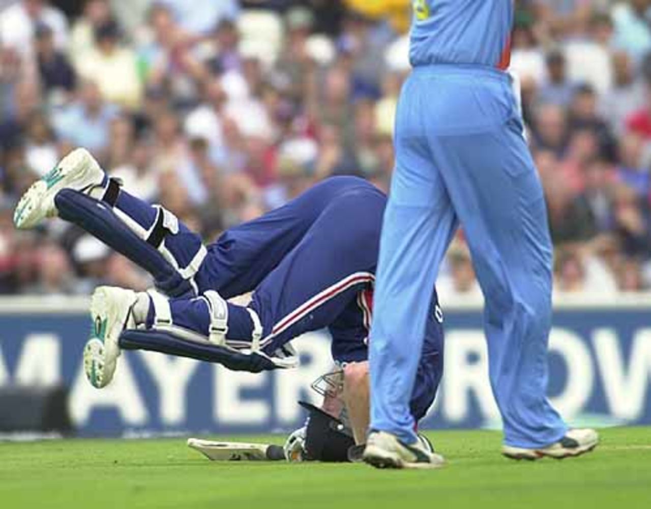 Freddie Flintoff takes a tumble as he struggles home safe in his innings of 51, England v India at The Oval, July 2002
