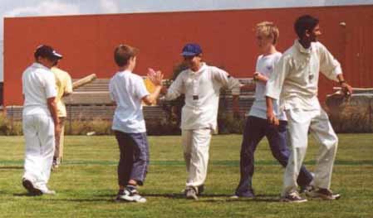 The team congratulate each other