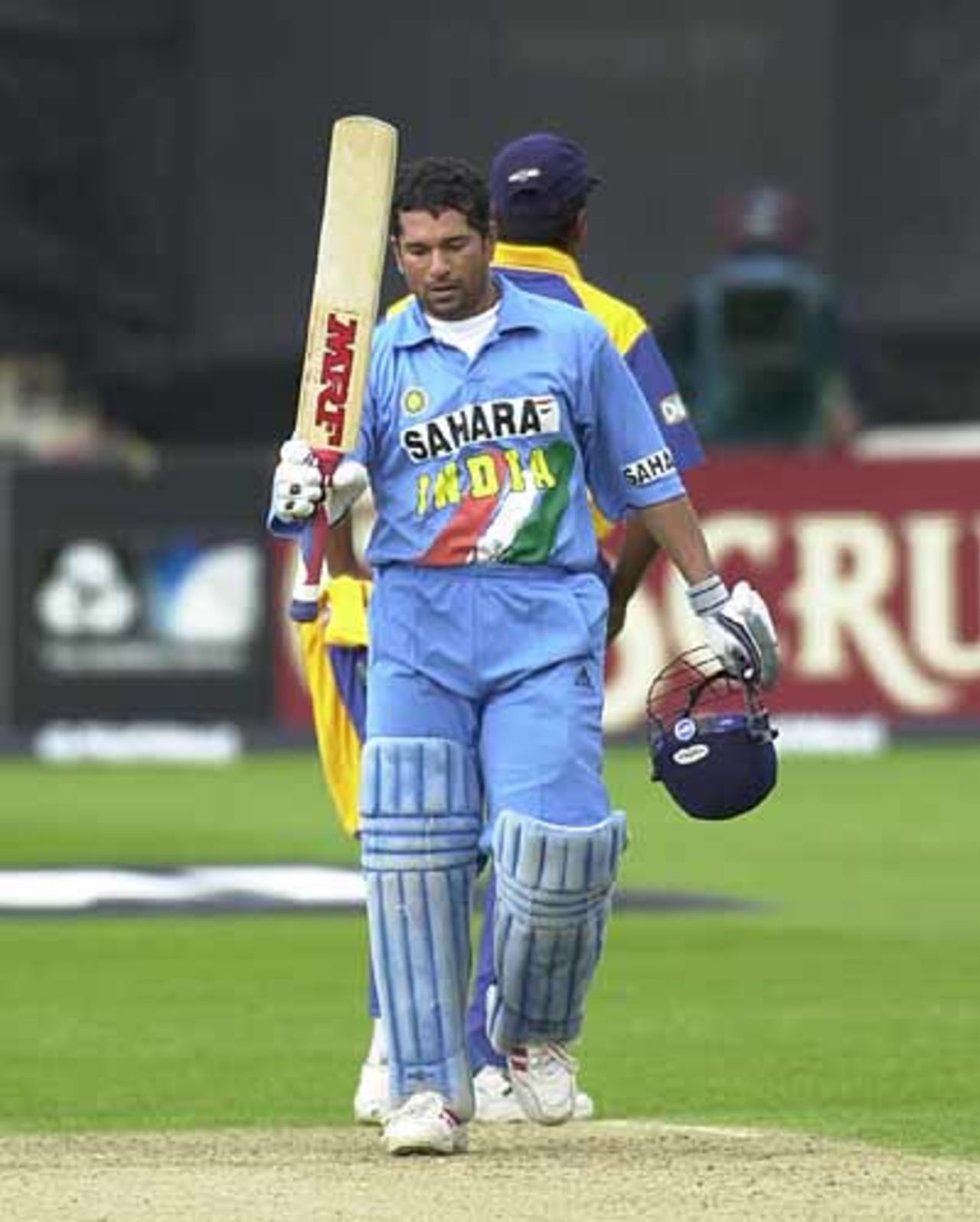 A subdued Tendulkar raises his bat on getting his 33rd One Day ton in internationals, India v Sri Lanka at Bristol 11th Jul 2002