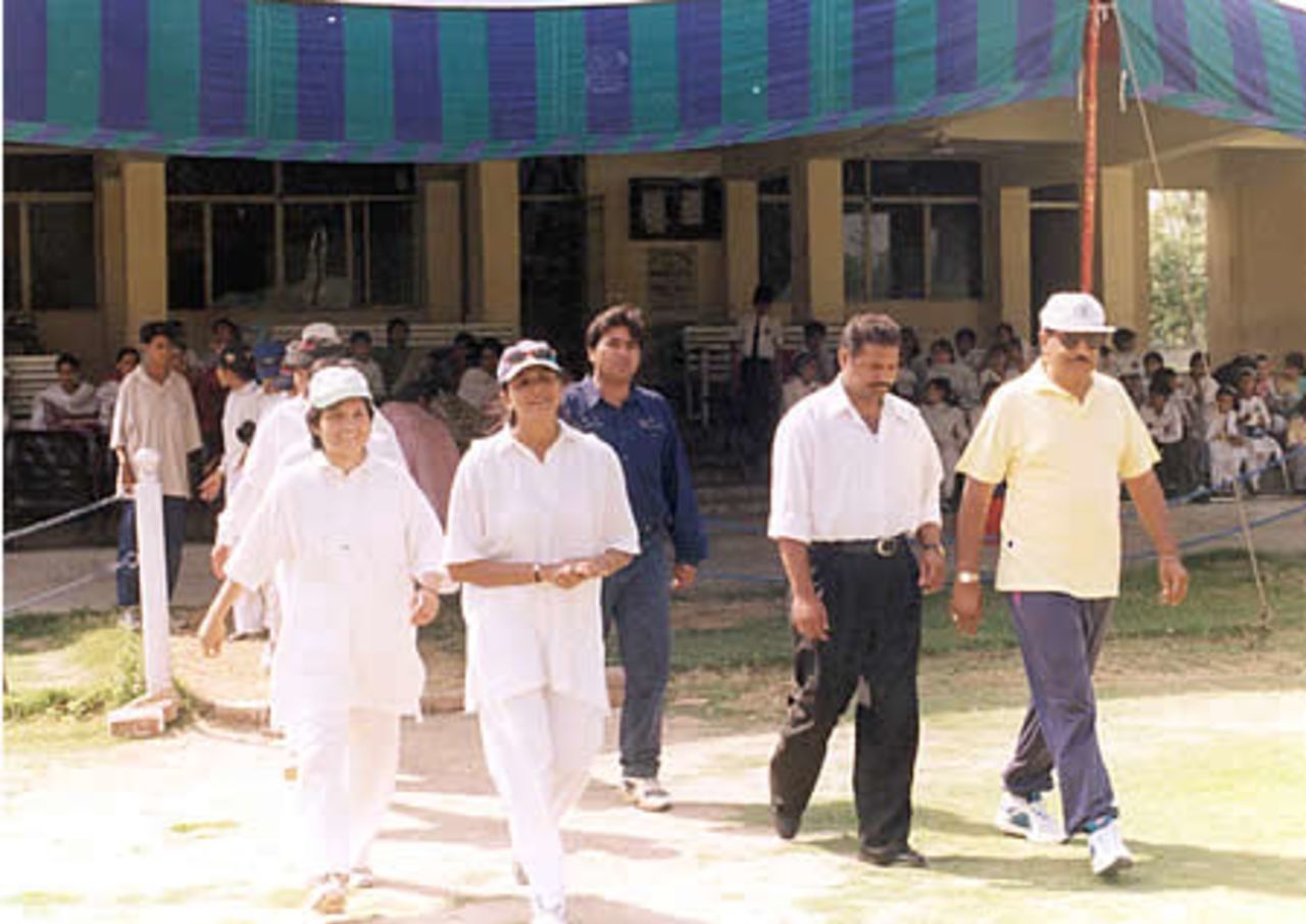 The Punjab women cricket team and umpires coming out for a match, LCCA Ground, Lahore