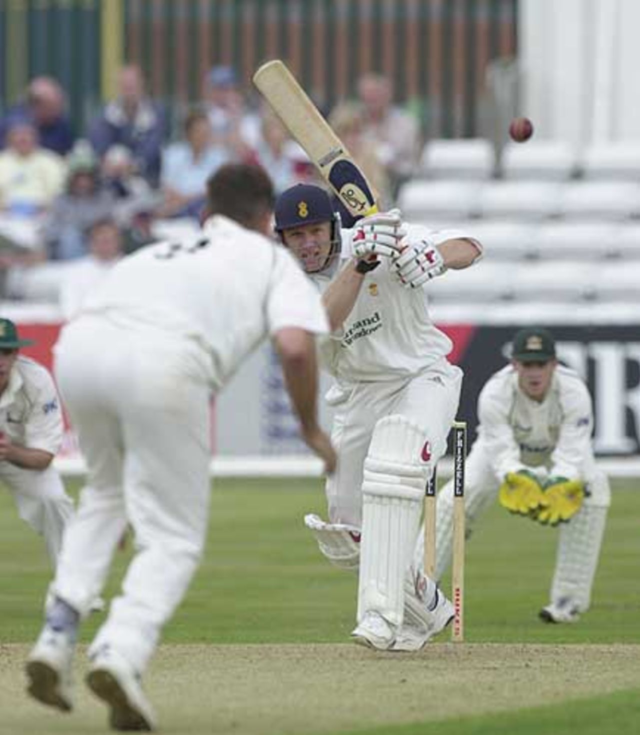 Derbyshire's Andrew Gait manages to squeeze a Smith delivery back through mid-on, Derby v Notts, Frizzell Div 2, July 2002