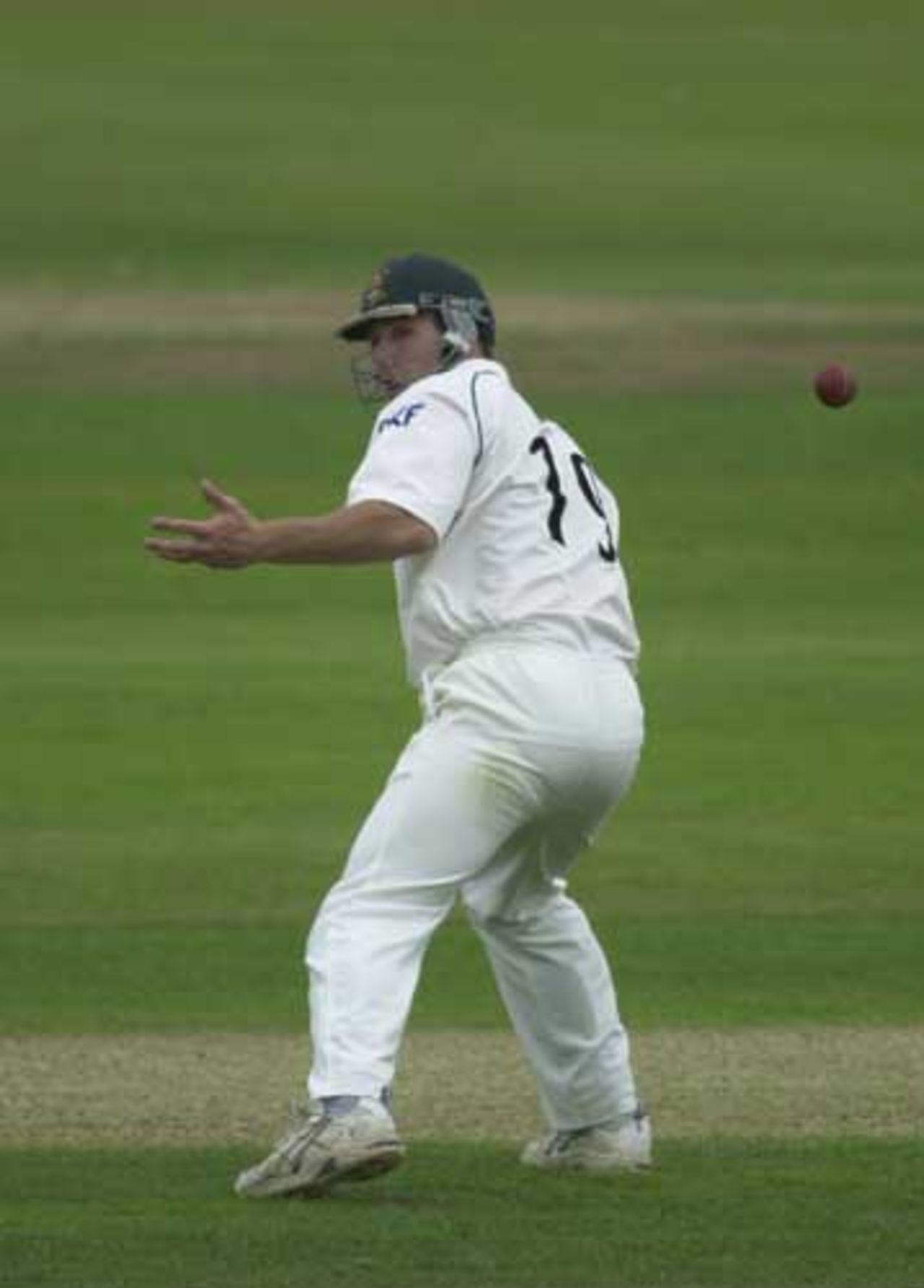 A delivery from Dowman slips passed Weltons hand as he fields short leg.  Frizzell County Championship, Derbyshire v Notts first day, 2002.