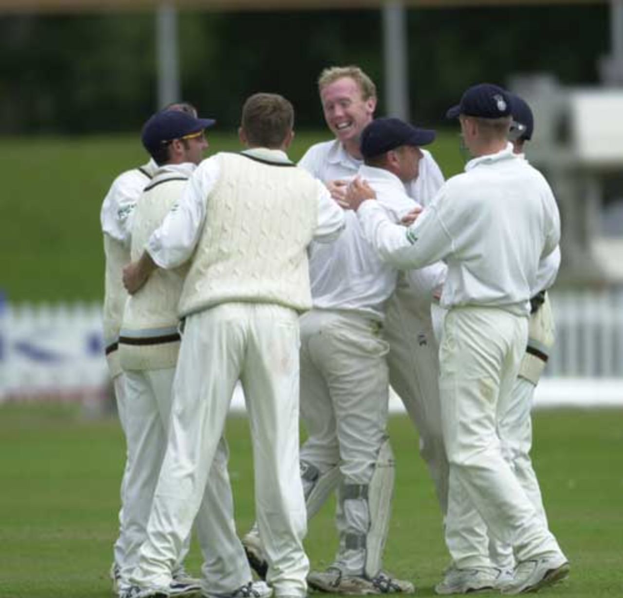 Kevin Dean celebrates as he claims another wicket for Derbyshire, Welton out for 4 runs.  Frizzell CC, 22nd July 2002.